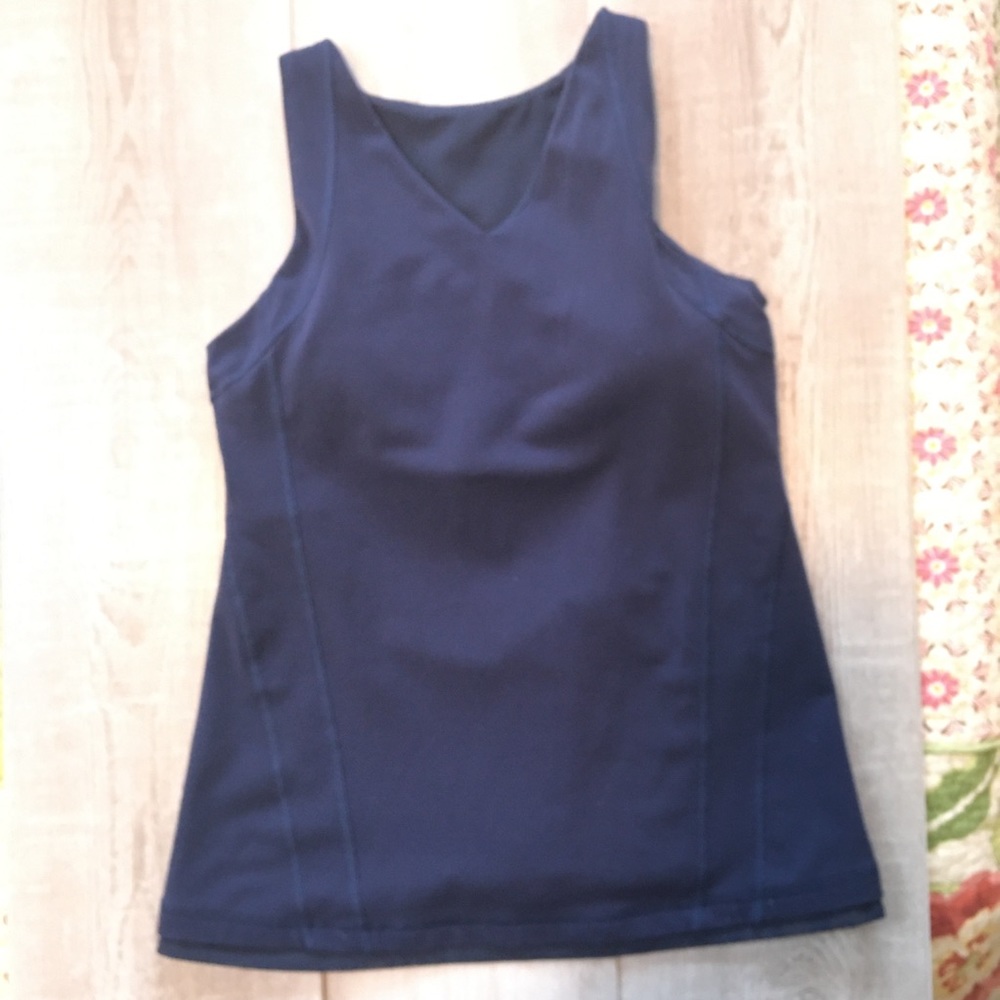 Lululemon Blue top. Built in bra. Size below